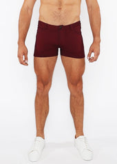Maroon form-fitting shorts with classic button closure and side pockets for mens summer lightweight essentials