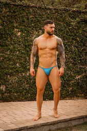 A vibrant blue form-fitting swim trunks from jor men’s swimwear 2026 featuring a snug fit and minimalistic design