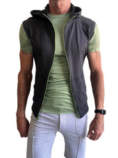 Dark gray hooded vest with light green zipper and lining worn over olive green t shirt for ethical mens athleisure wear
