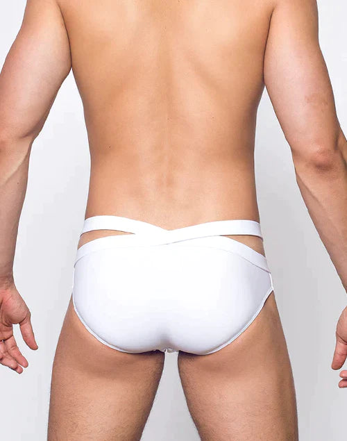 White sleek swim trunks with a distinctive crisscross double strap design at the back for an opulent beach look