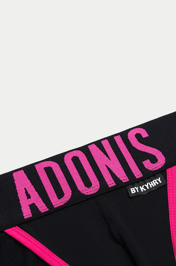 Black athletic briefs with bold pink adonis lettering and trim featuring a by kyhry tag for activewear use