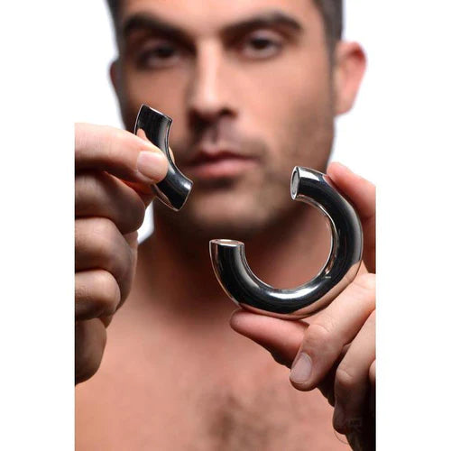Shiny silver metallic c-shaped stainless steel magnetic ball stretcher for mastering the art of pleasure