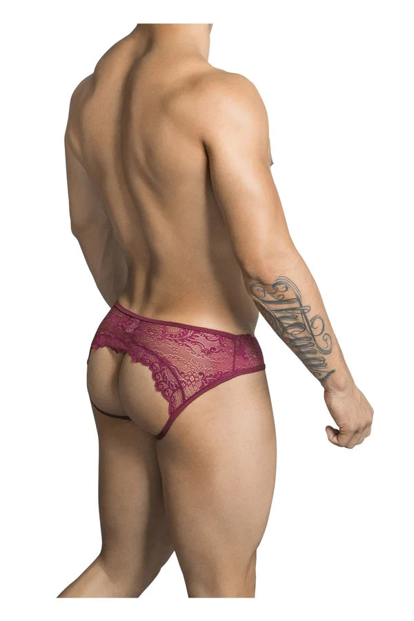 A maroon lace thong with intricate floral patterns highlighting the sensual charm of the candyman 99312 jockstrap burgundy