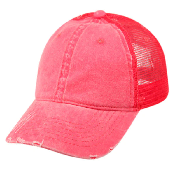 Pink distressed pigment dyed washed cotton trucker cap with mesh back and button top shown from the back side