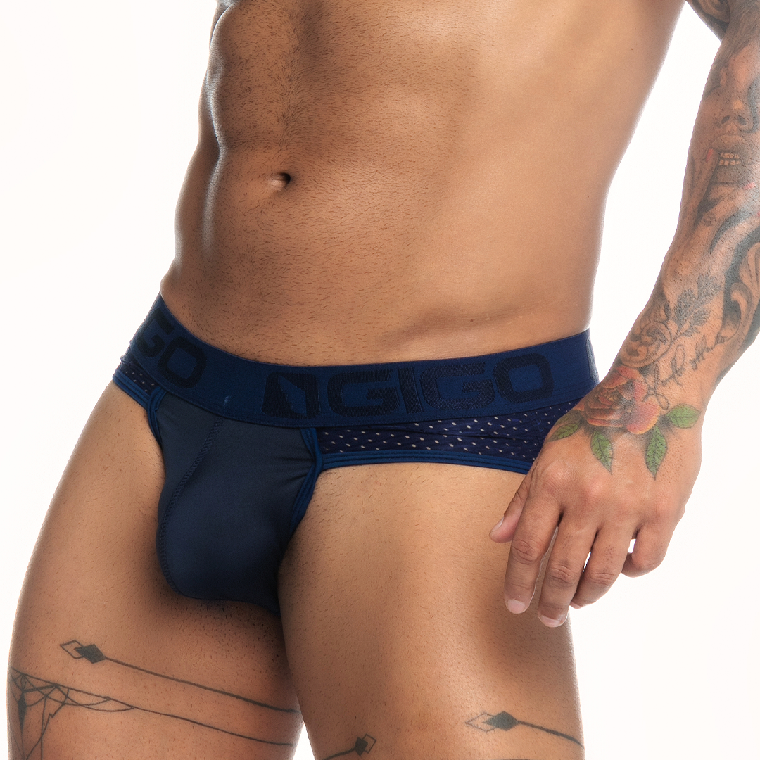 Navy blue mesh briefs with a solid waistband featuring the brand name gico for sexy gay underwear and self-expression