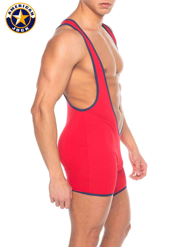 A red american jock wrestling singlet with navy blue trim for athletic performance featured in a j phys ed super scoop singlet article