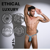 Male model wearing a light blue Justin+Simon thong, showcasing ethical luxury and sustainable production.