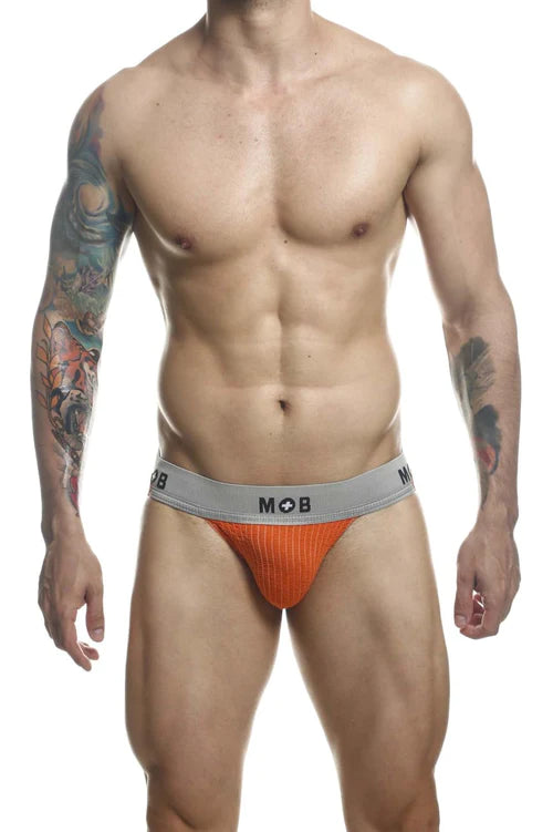 Orange textured briefs with gray waistband featuring mob logo from malebasics classic fetish jock collection