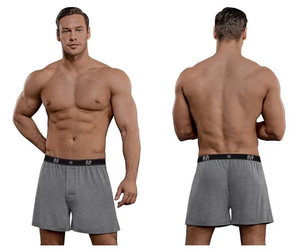 Gray cotton boxer shorts with a black elastic waistband featuring a repeating logo pattern for comfortable wear