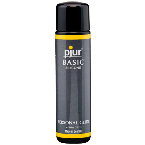 Black cylindrical bottle with yellow accents and black cap labeled pjur basic silicone personal glide for optimal lubricant performance