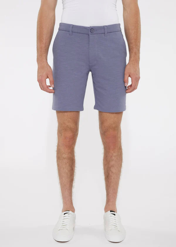 A pair of men’s tailored solid light gray stretch knit shorts with belt loops and a button closure at the waist