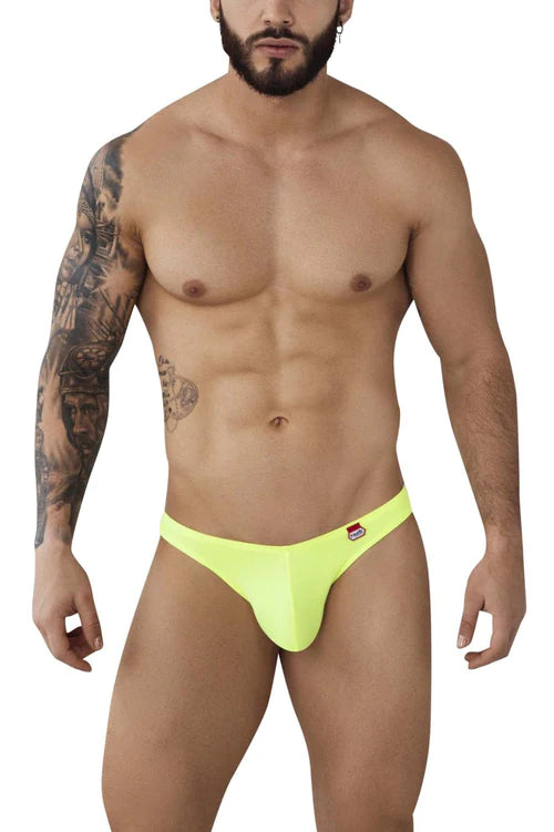 Bright neon yellow angola thong with small red and white logo on left hipband shown from the back side