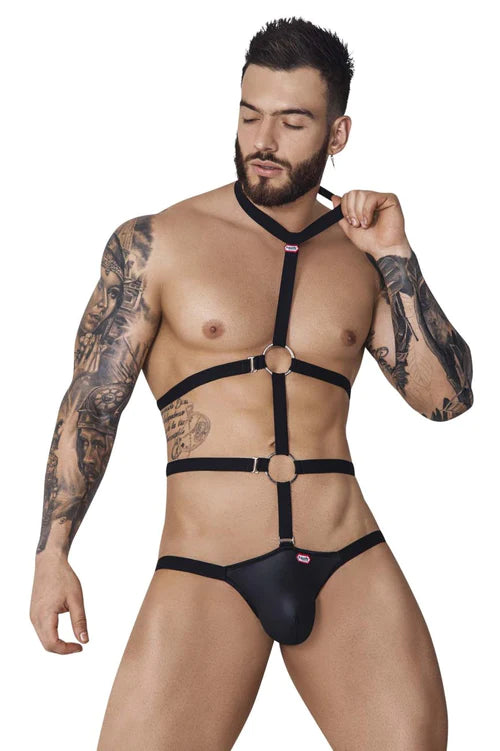 Black leather harness bodysuit with adjustable straps and metal rings featured in pikante pik 1088 hard harness jockstrap article