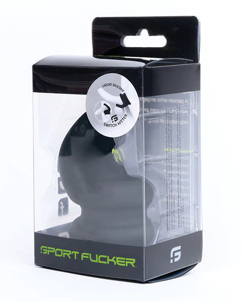 Black liquid silicone sport fucker switch hitter in clear and black packaging with green branding for versatile use