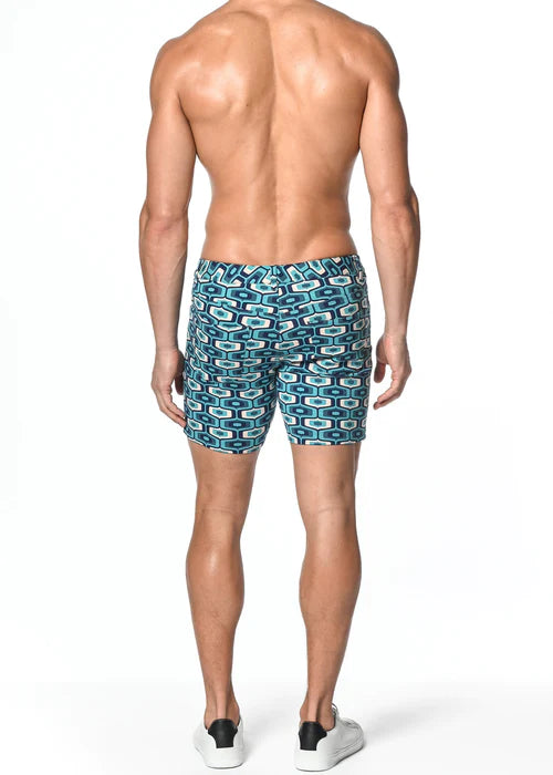 Men’s teal and white geometric patterned stretch knit swim trunks combining style and comfort from ST33LE limited edition.