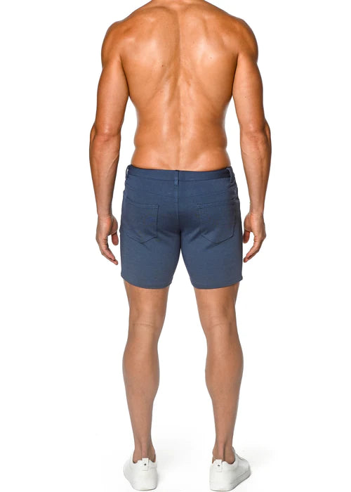 Navy blue cotton st33le stretch knit shorts with a sleek tailored fit and two back pockets shown from the back side