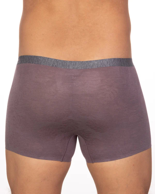 Purple boxer briefs with textured gray waistband showcasing comfort and style from andrew velasco underwear