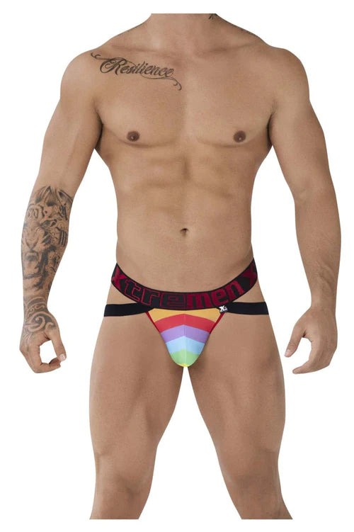Rainbow-striped men’s microfiber briefs with a black waistband and red extremen branding in pride colors
