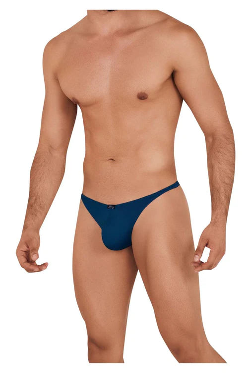 Xtremen 91095 microfiber men’s thong in petrol blue with a small logo on the waistband shown from the back side