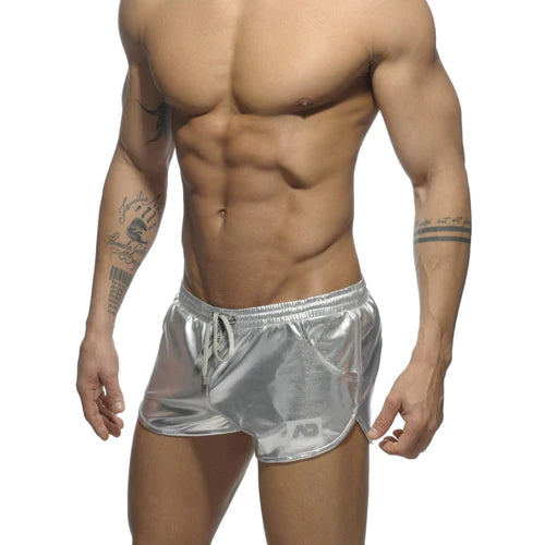 Silver metallic athletic shorts with drawstring waistband and side pockets perfect for stylish party wear