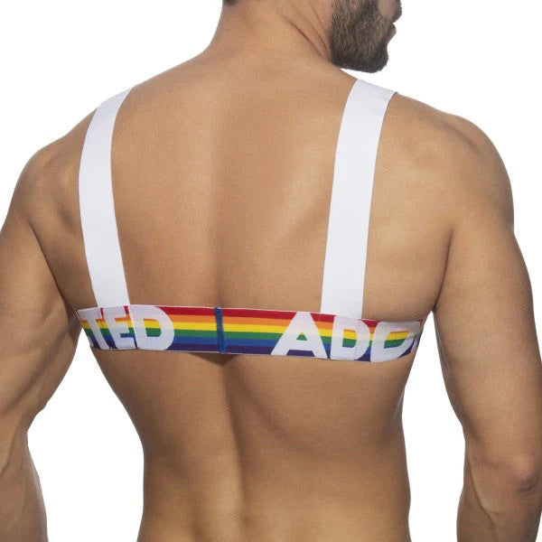 White strap backless bra with rainbow-colored band featuring ted and adidas lettering shown from the back