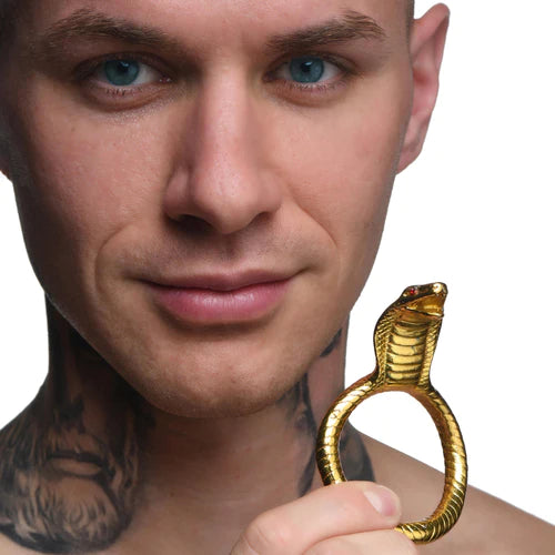 Golden cobra-shaped cock ring with detailed scales and raised hood from master series enhancing pleasure