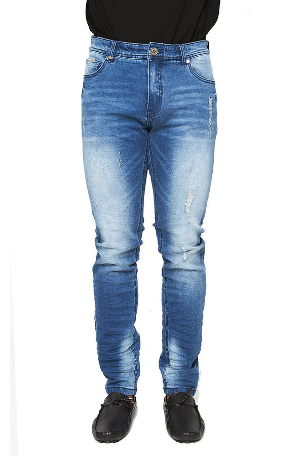 Blue distressed denim jeans with slim fit and faded wash perfect for trendy and comfortable rugged casual wear