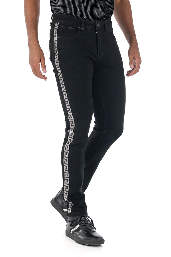 Black denim jeans featuring a bold white greek key pattern along the outer seam from the show stopper jean collection