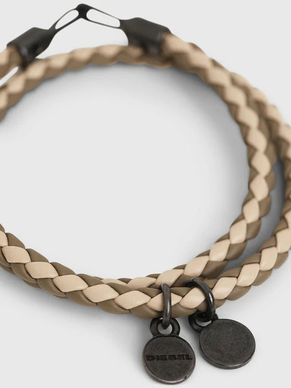 Tan and beige braided leather diesel alucy bracelet with black metal clasp and two circular tags as stylish accessory