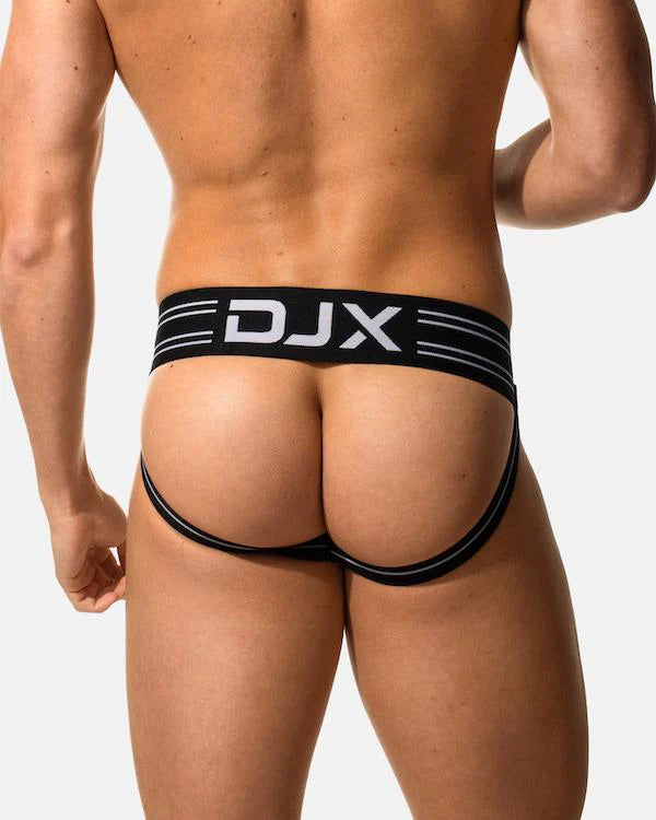 Black djx brand briefs with white lettering and striped detailing shown from the back in the ultimate guide to the brutus jockstrap