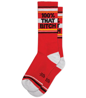 Red crew socks with white toe and heel featuring bold black 100% that bitch text for ultimate comfort and style