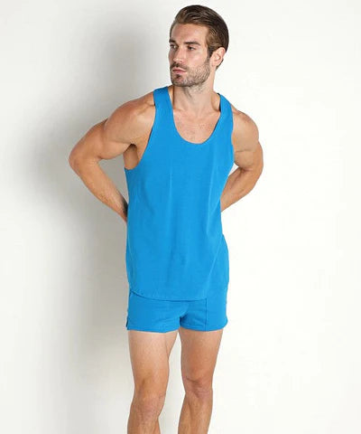 Bright blue athletic tank top and matching shorts set from the lasc gym tank turquoise collection for fitness use