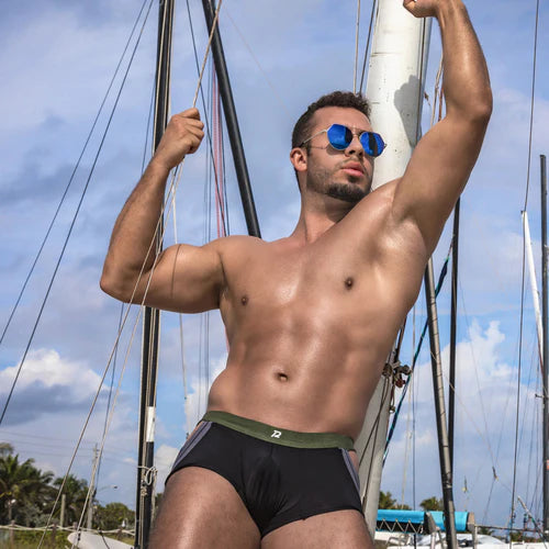 Black swim trunks pistol pete PPG044 with green waistband and white number 2 open sides piping boxer design