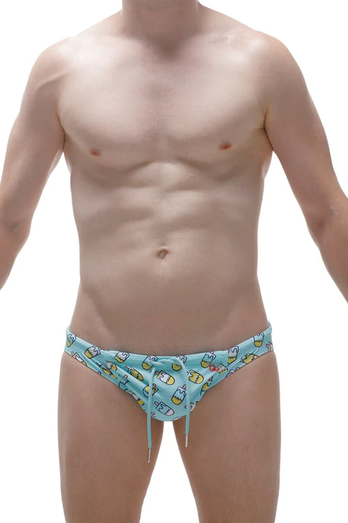 Light blue petitq swim trunks with playful yellow and white cartoon ice cream cone pattern for trendy beach style