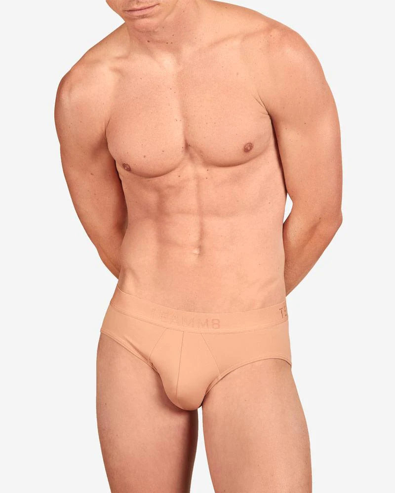 Beige men’s briefs from teamm8 skin brief with subtle logo on waistband made for everyday comfort