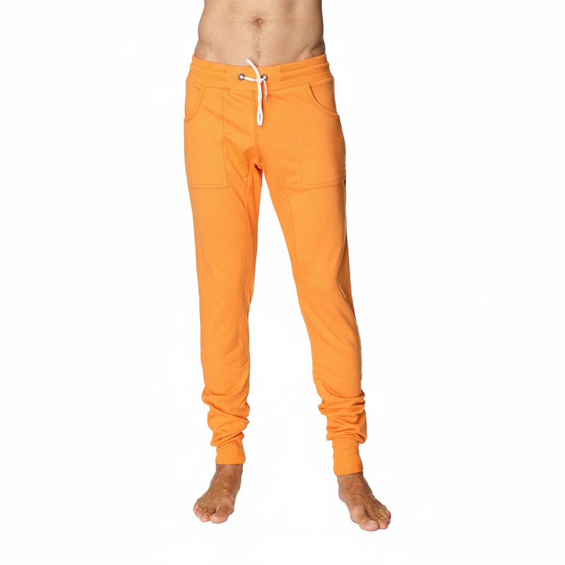 Bright orange joggers with white drawstring and elastic cuffs from 4-rth sexy gay men’s athleisure and yoga apparel collection