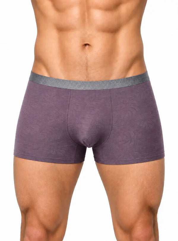 Purple trunks with gray waistband on muscular male torso, white background.