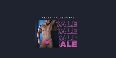 A man wearing bright pink briefs from gay men’s underwear and swimwear clearance under 10 dollars.