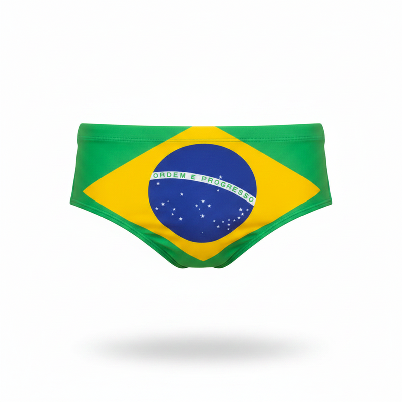 Green and yellow swim trunks with brazilian flag design featuring blue circle white stars and ordem e progresso text from ca-rio-ca sunga co