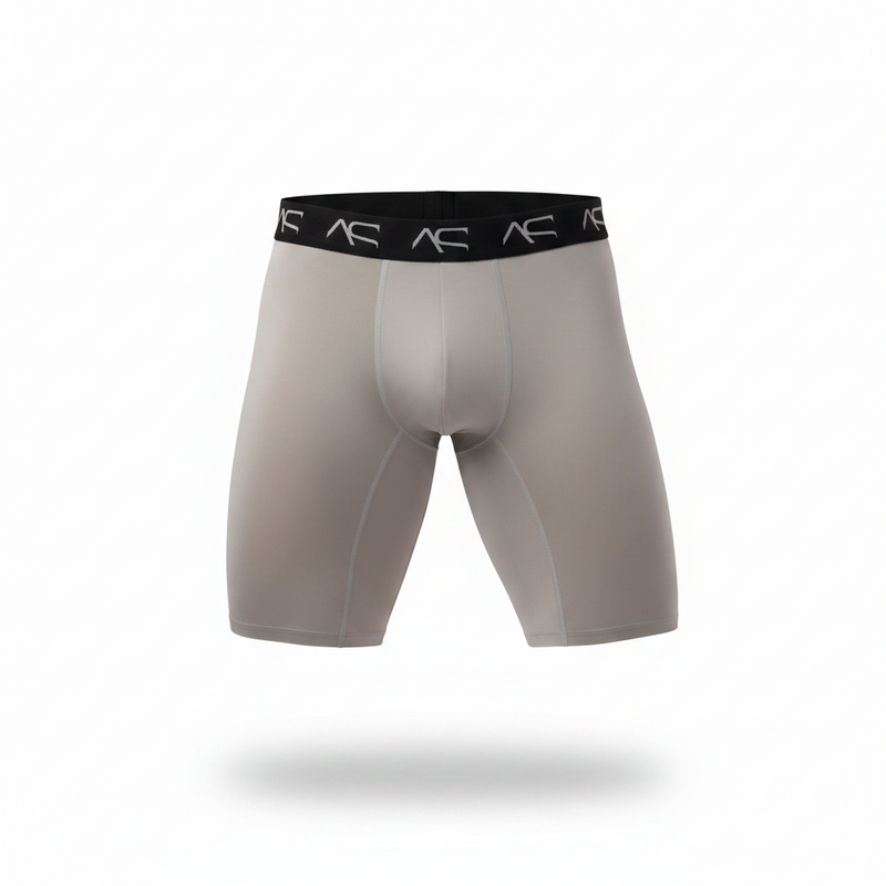 Gray ac/ac branded compression shorts with black waistband and white logo repeats from Adam Smith Wear sexy gay mens underwear.