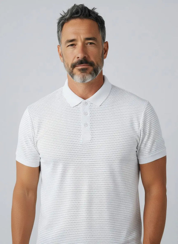 Man wearing white textured knit polo shirt with collar and three buttons.