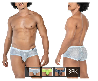 Man wears light blue floral sheer briefs against a plain white background.