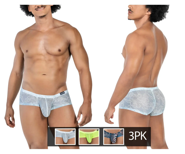 Man wears light blue floral sheer briefs against a plain white background.