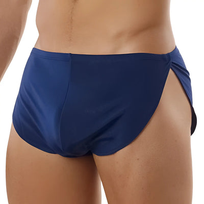 Person wearing smooth blue swim trunks with high-cut sides, isolated against white.