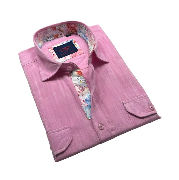 Folded pink button-down shirt with floral collar lining on white background.