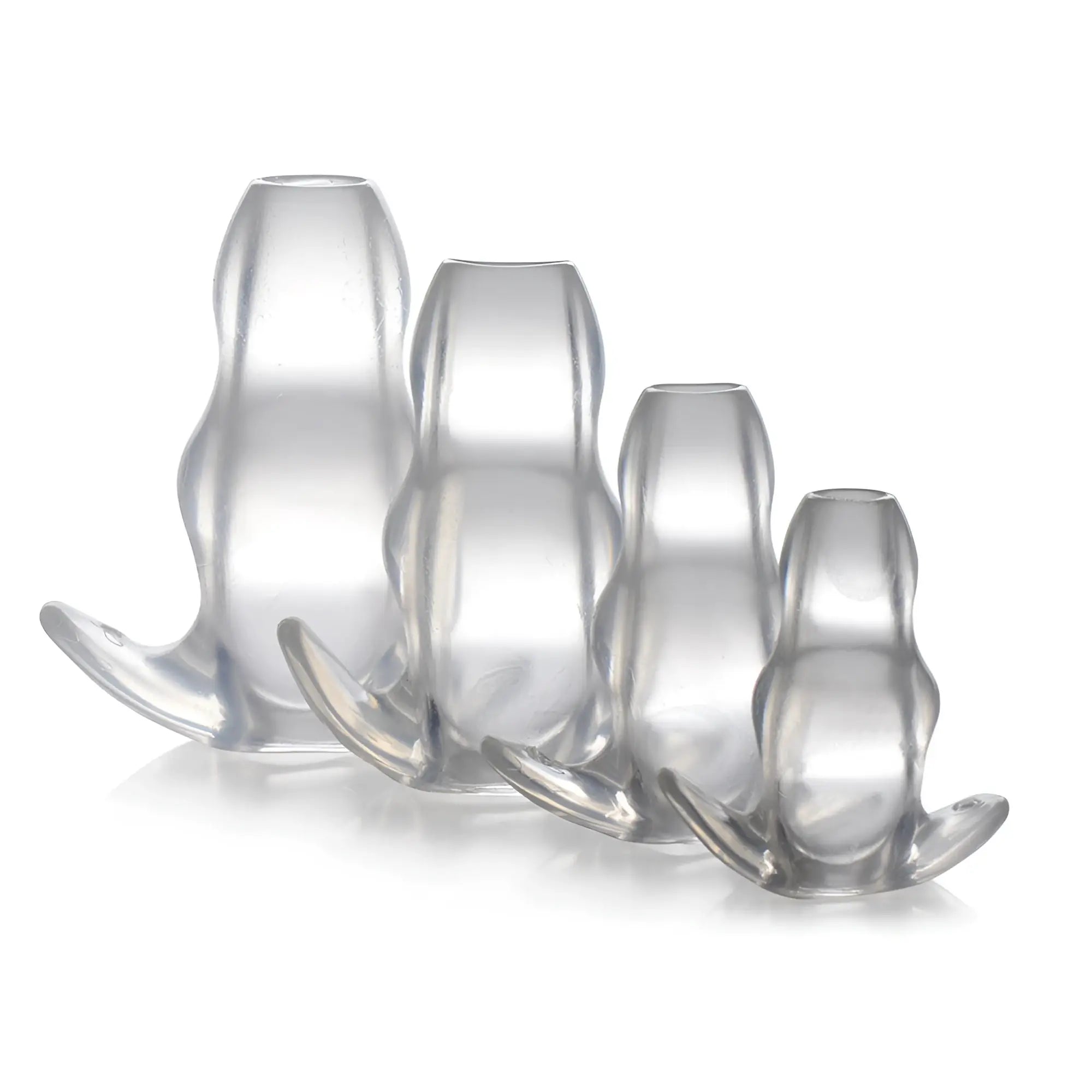 Four graduated clear silicone anal plugs with flared bases, white background.