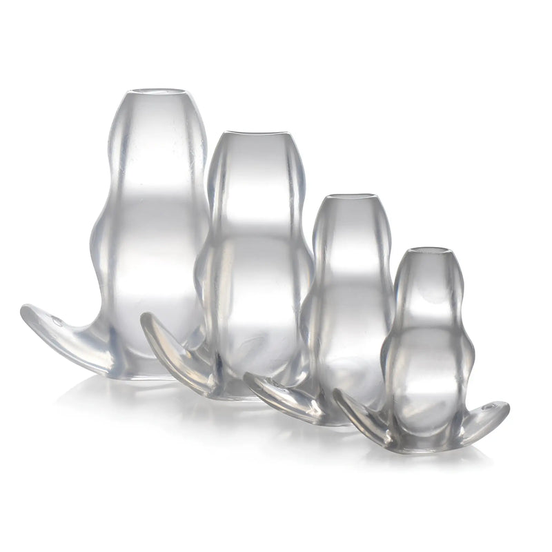 Four graduated clear silicone anal plugs with flared bases, white background.