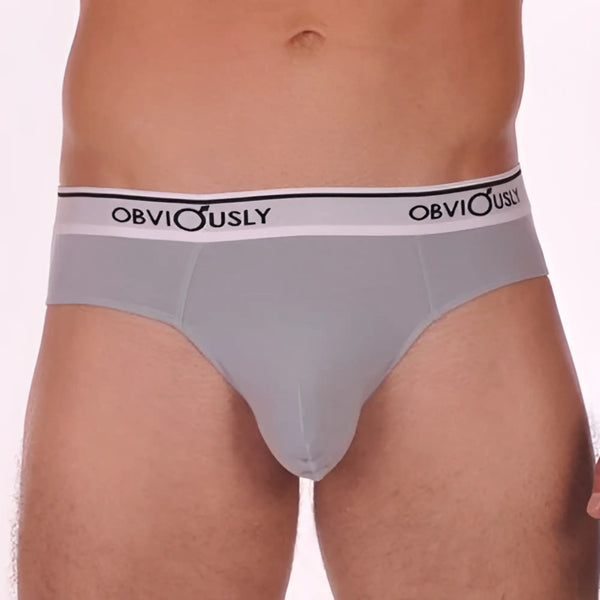 Gray cotton briefs with a white waistband on a man, white background.