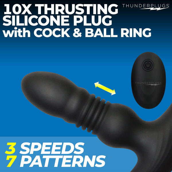 A matte black silicone device with a remote on a blue background.