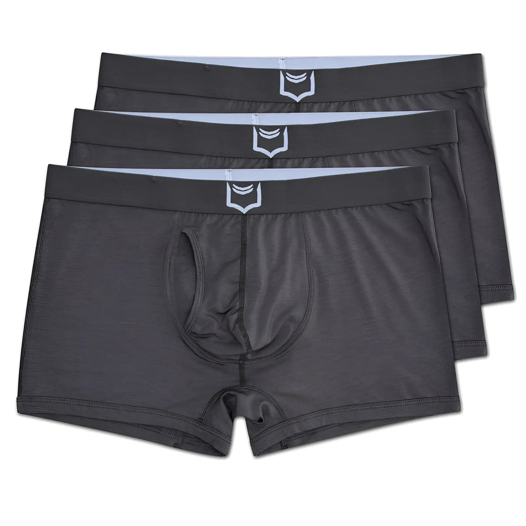 Dark gray men’s sheath 2.1 dual pouch trunks boxer briefs with white shield logo on waistband in a 3 pack bundle